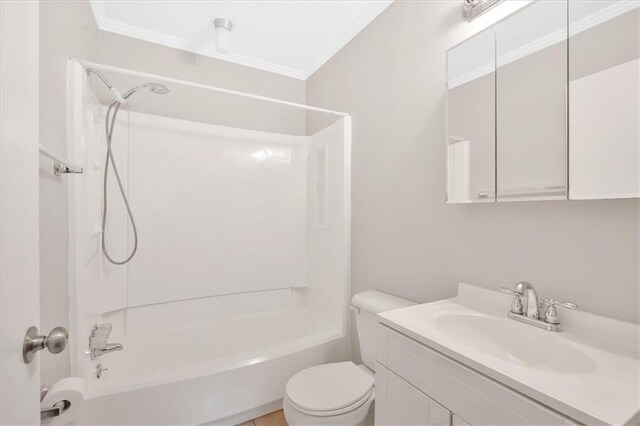 full bathroom with toilet, bathtub / shower combination, vanity, and ornamental molding