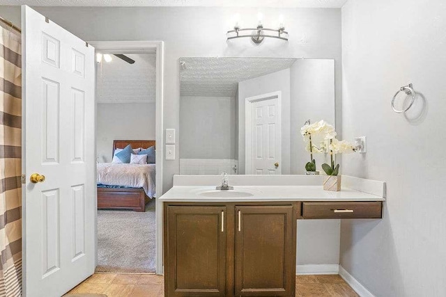 bathroom featuring vanity and a textured ceiling