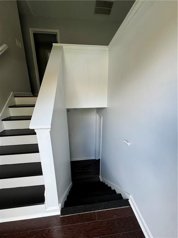 stairs with wood-type flooring