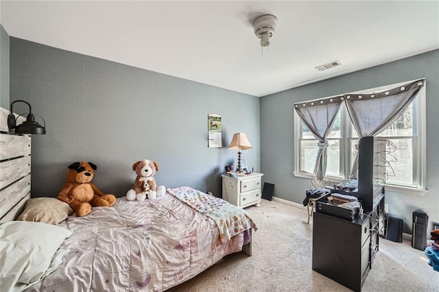 bedroom with baseboards, visible vents, and carpet flooring