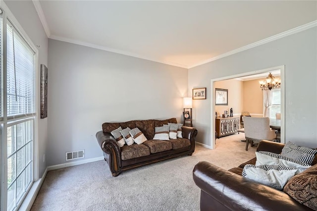 living room featuring ornamental molding, visible vents, light carpet, and baseboards