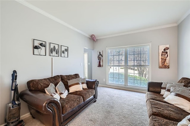 living area with baseboards, ornamental molding, and carpet flooring