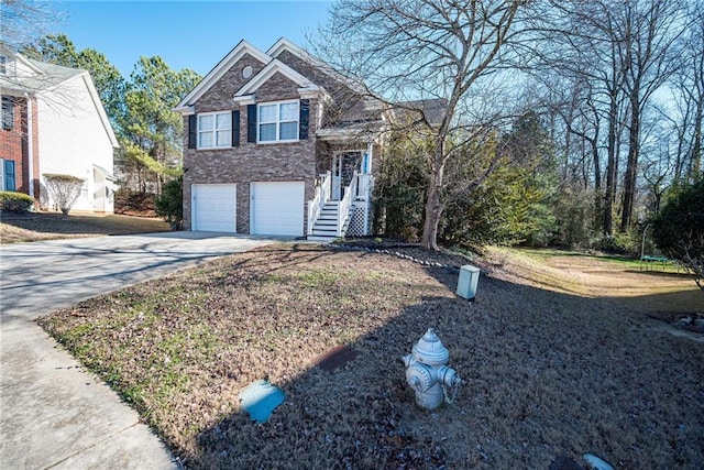 view of front of property with a garage