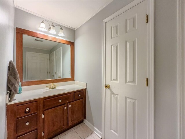 2700 Pine Tree Rd NE Unit 1013, Atlanta, GA 30324 - full bath with baseboards, vanity, and tile patterned flooring