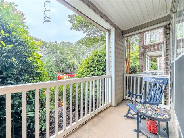 2700 Pine Tree Rd NE Unit 1013, Atlanta, GA 30324 - laundry room featuring water heater and washing machine and dryer