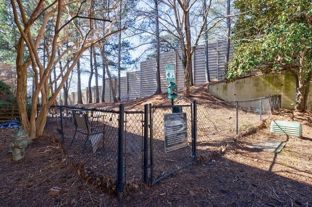 2700 Pine Tree Rd NE Unit 1013, Atlanta, GA 30324 - view of front facade featuring french doors, stucco siding, a chimney, a porch, and a shingled roof