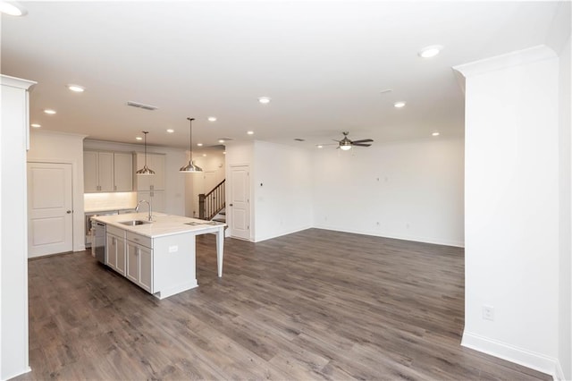816 Dodd Trl S Unit 172, Buford, GA 30518 - kitchen featuring a ceiling fan, a sink, dishwasher, a kitchen breakfast bar, and a kitchen island with sink