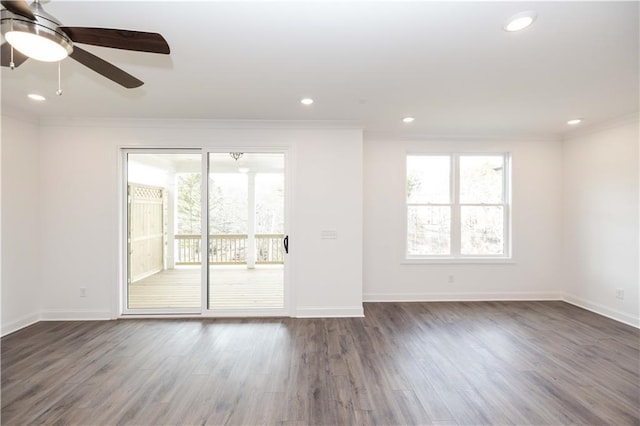 816 Dodd Trl S Unit 172, Buford, GA 30518 - spare room with crown molding, plenty of natural light, baseboards, dark wood-type flooring, and recessed lighting