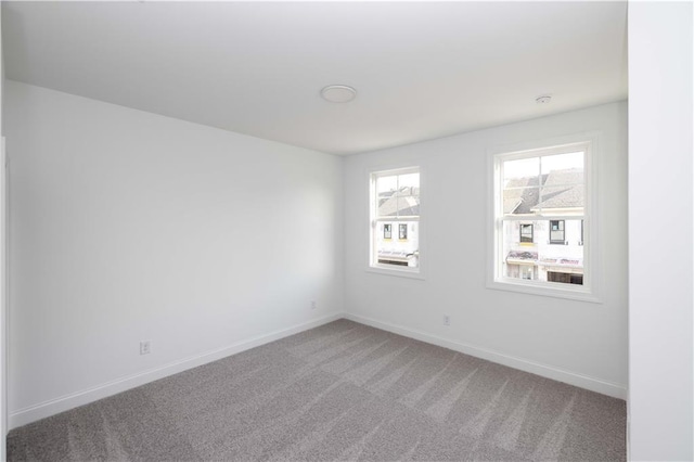 816 Dodd Trl S Unit 172, Buford, GA 30518 - carpeted spare room with baseboards