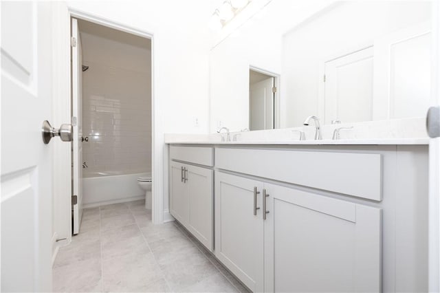 816 Dodd Trl S Unit 172, Buford, GA 30518 - bathroom featuring double vanity, toilet, and shower / tub combination