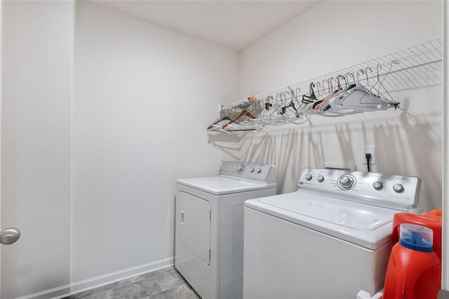 5755 Turnstone Trl, Flowery Branch, GA 30542 - washroom with washing machine and dryer and baseboards