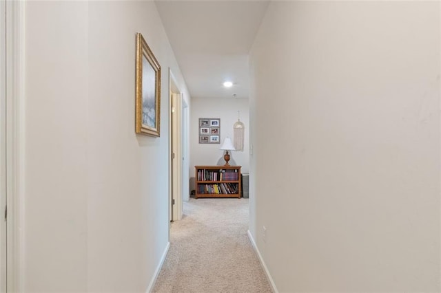 5755 Turnstone Trl, Flowery Branch, GA 30542 - hallway featuring light colored carpet, baseboards, and recessed lighting