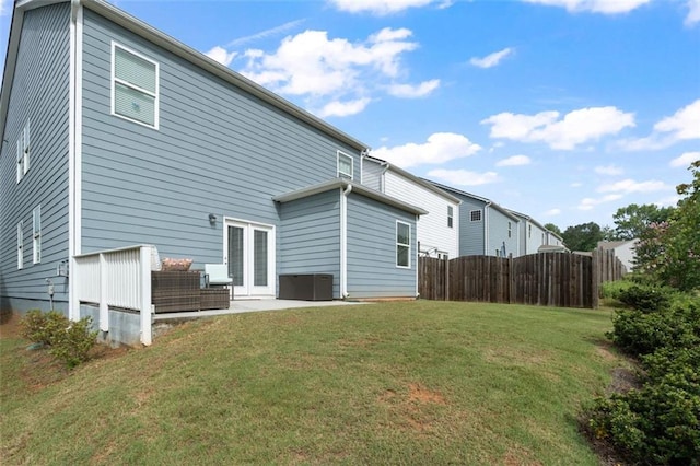5755 Turnstone Trl, Flowery Branch, GA 30542 - back of property with a patio area and central air condition unit