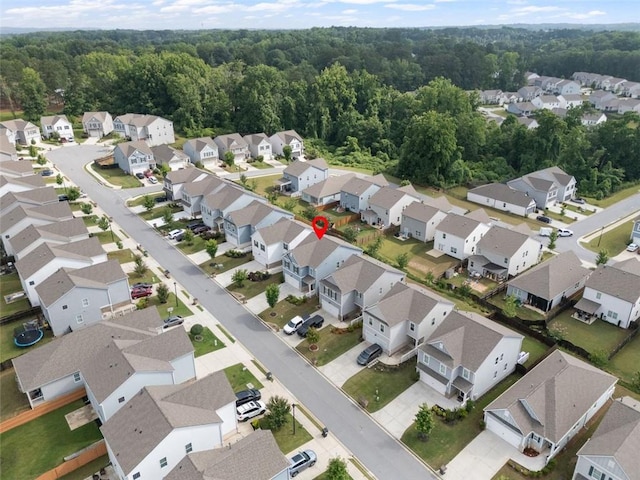 5755 Turnstone Trl, Flowery Branch, GA 30542 - aerial view of property's location with nearby suburban area and a heavily wooded area