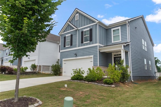 5755 Turnstone Trl, Flowery Branch, GA 30542 - view of front of house featuring board and batten siding, concrete driveway, an attached garage, and a front lawn