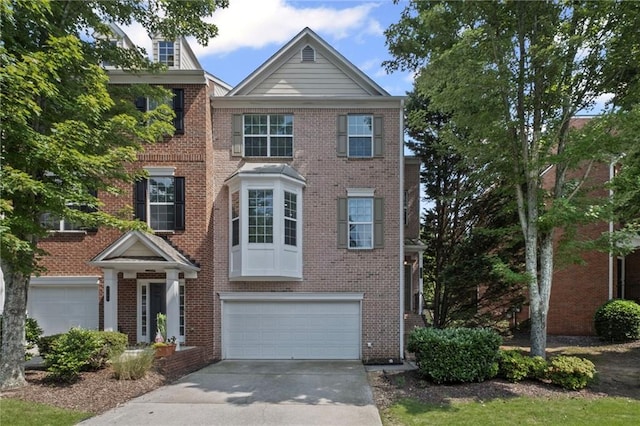 5159 Wellsley Bnd, Alpharetta, GA 30005 - view of front of property featuring an attached garage, driveway, and brick siding