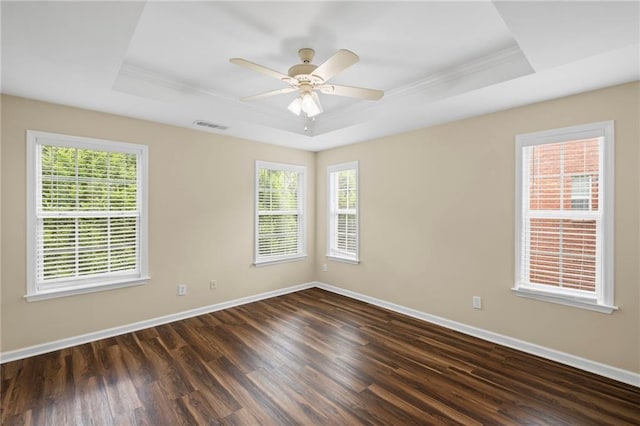 5159 Wellsley Bnd, Alpharetta, GA 30005 - spare room with a raised ceiling, crown molding, dark wood-style floors, healthy amount of natural light, and baseboards