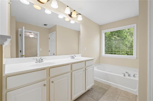 5159 Wellsley Bnd, Alpharetta, GA 30005 - bathroom featuring double vanity, a bath, tile patterned floors, and a ceiling fan