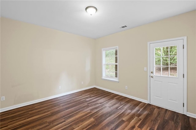 5159 Wellsley Bnd, Alpharetta, GA 30005 - unfurnished room featuring plenty of natural light, dark wood finished floors, and baseboards