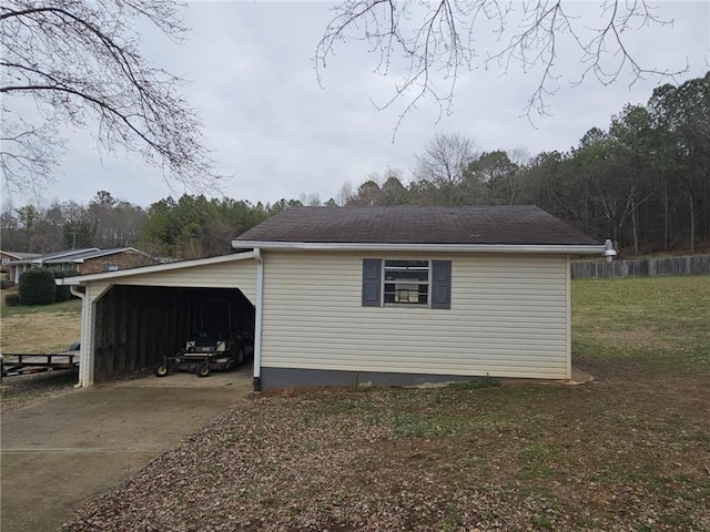 view of home's exterior featuring a carport