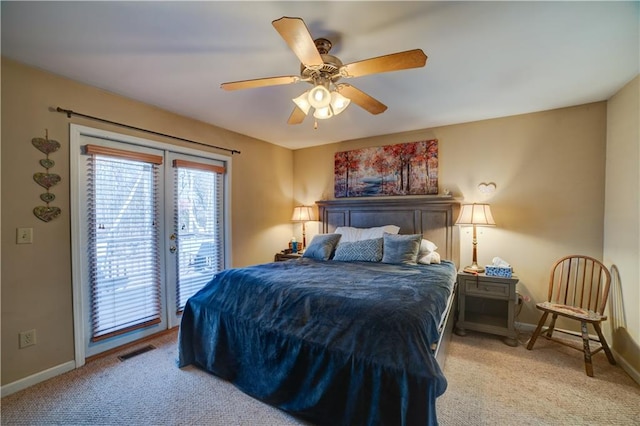 carpeted bedroom with ceiling fan and access to outside