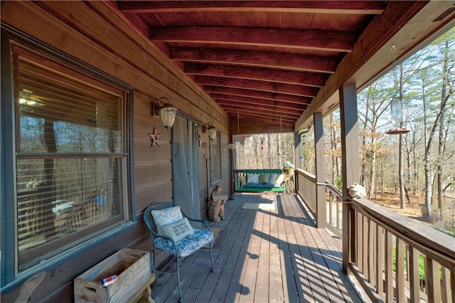 wooden terrace featuring a porch