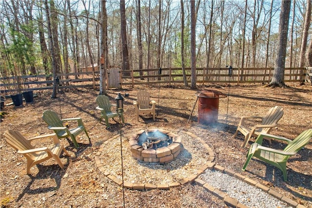 view of patio / terrace featuring an outdoor fire pit