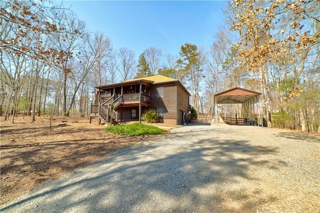 exterior space with a carport