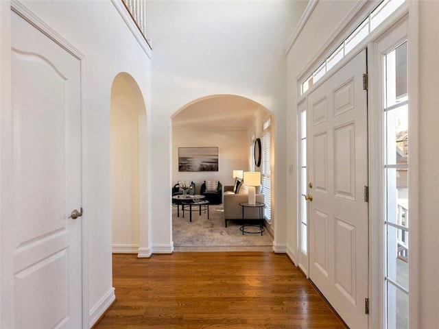 2750 Olde Towne Pkwy, Duluth, GA 30097 - foyer with wood finished floors, arched walkways, and baseboards
