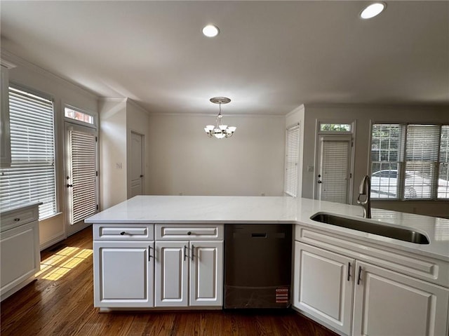2750 Olde Towne Pkwy, Duluth, GA 30097 - kitchen with a sink, a chandelier, dishwasher, ornamental molding, and dark wood-style flooring