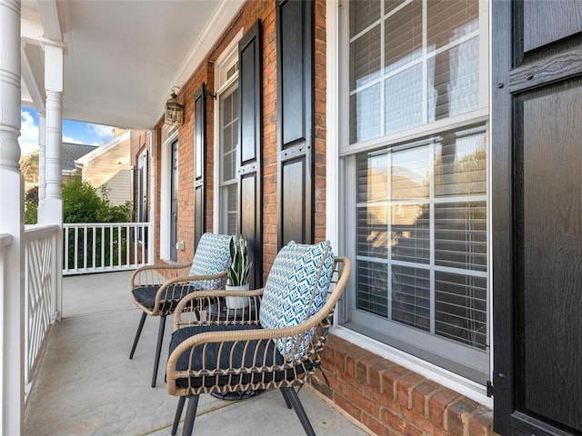 balcony featuring covered porch