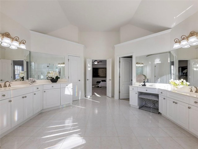 bathroom with vanity, high vaulted ceiling, tile patterned floors, and ceiling fan