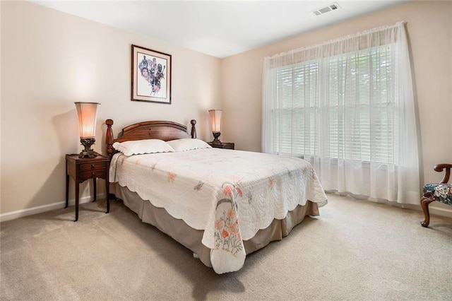 1898 Alcovy Shoals Blf SE, Lawrenceville, GA 30045 - bedroom featuring light colored carpet and baseboards