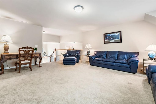 1898 Alcovy Shoals Blf SE, Lawrenceville, GA 30045 - carpeted living room featuring lofted ceiling and baseboards