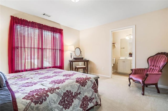 1898 Alcovy Shoals Blf SE, Lawrenceville, GA 30045 - bedroom with carpet floors, baseboards, and ensuite bathroom