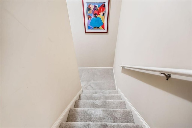 1898 Alcovy Shoals Blf SE, Lawrenceville, GA 30045 - stairs featuring carpet floors and baseboards