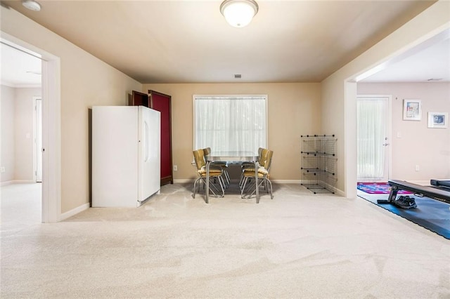 1898 Alcovy Shoals Blf SE, Lawrenceville, GA 30045 - dining area featuring baseboards and light colored carpet