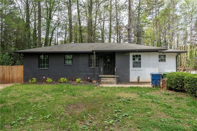 2191 Camp Ground Rd, Atlanta, GA 30331 - single story home with brick siding, fence, and a front lawn
