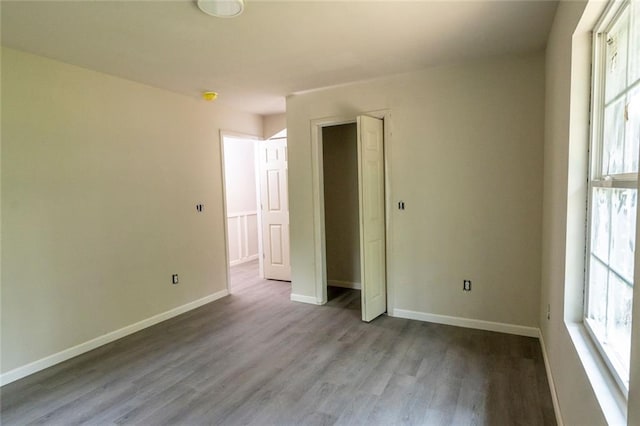 2191 Camp Ground Rd, Atlanta, GA 30331 - unfurnished bedroom with wood finished floors, baseboards, and a closet