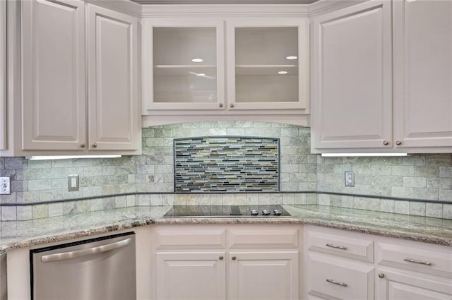 kitchen with glass insert cabinets, black electric stovetop, dishwasher, and white cabinets