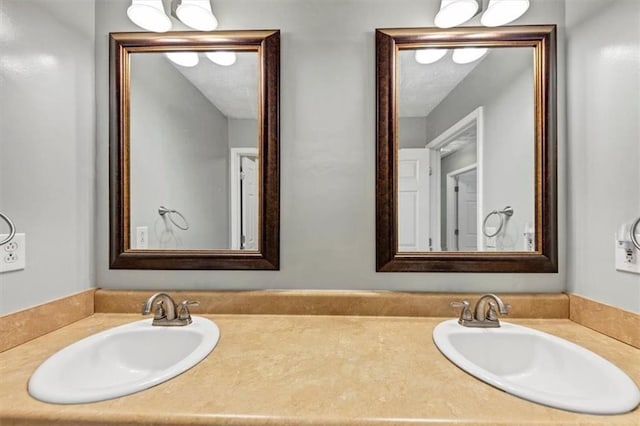 full bath featuring double vanity