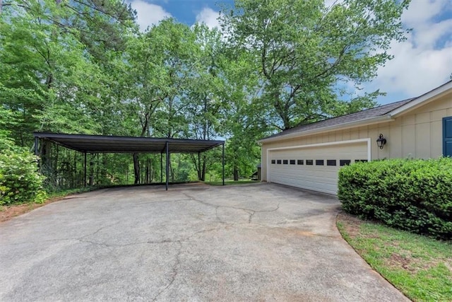 garage featuring driveway