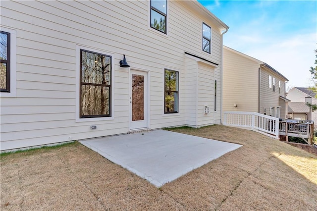 rear view of property with a patio area