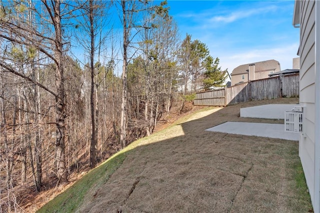 view of yard featuring a patio area and fence