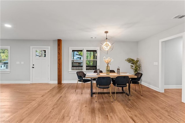 dining room with light hardwood / wood-style floors