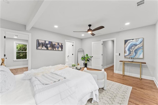 bedroom featuring beam ceiling, ceiling fan, and light hardwood / wood-style flooring