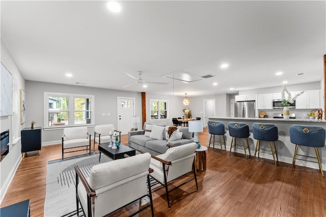 living room with dark hardwood / wood-style floors