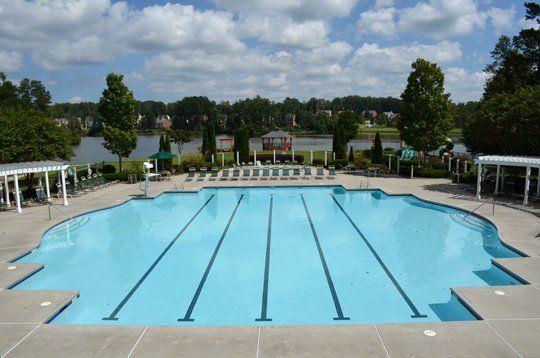 view of swimming pool with a pergola and a patio area