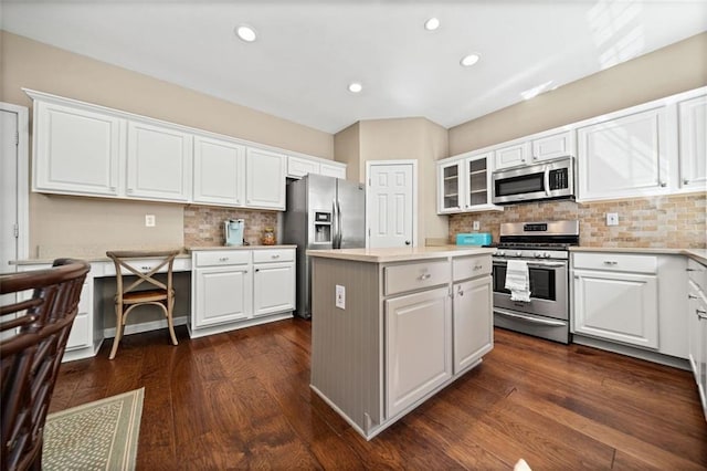 kitchen featuring white cabinetry, appliances with stainless steel finishes, and a center island