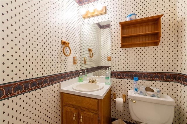 5425 Windswept Trce, Sugar Hill, GA 30518 - half bath featuring wallpapered walls, vanity, and toilet